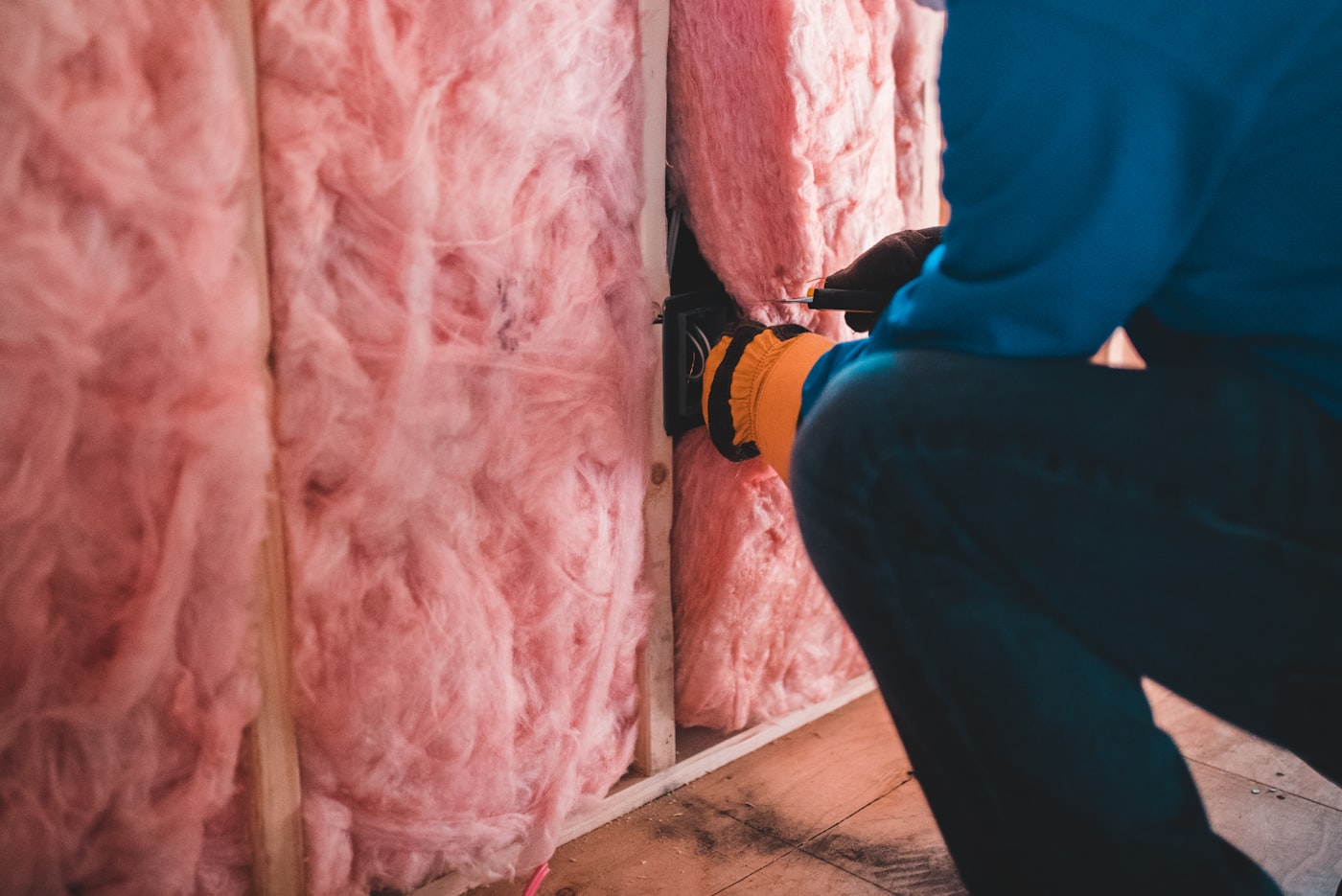 UM Plumbing technician repiping inside an open wall