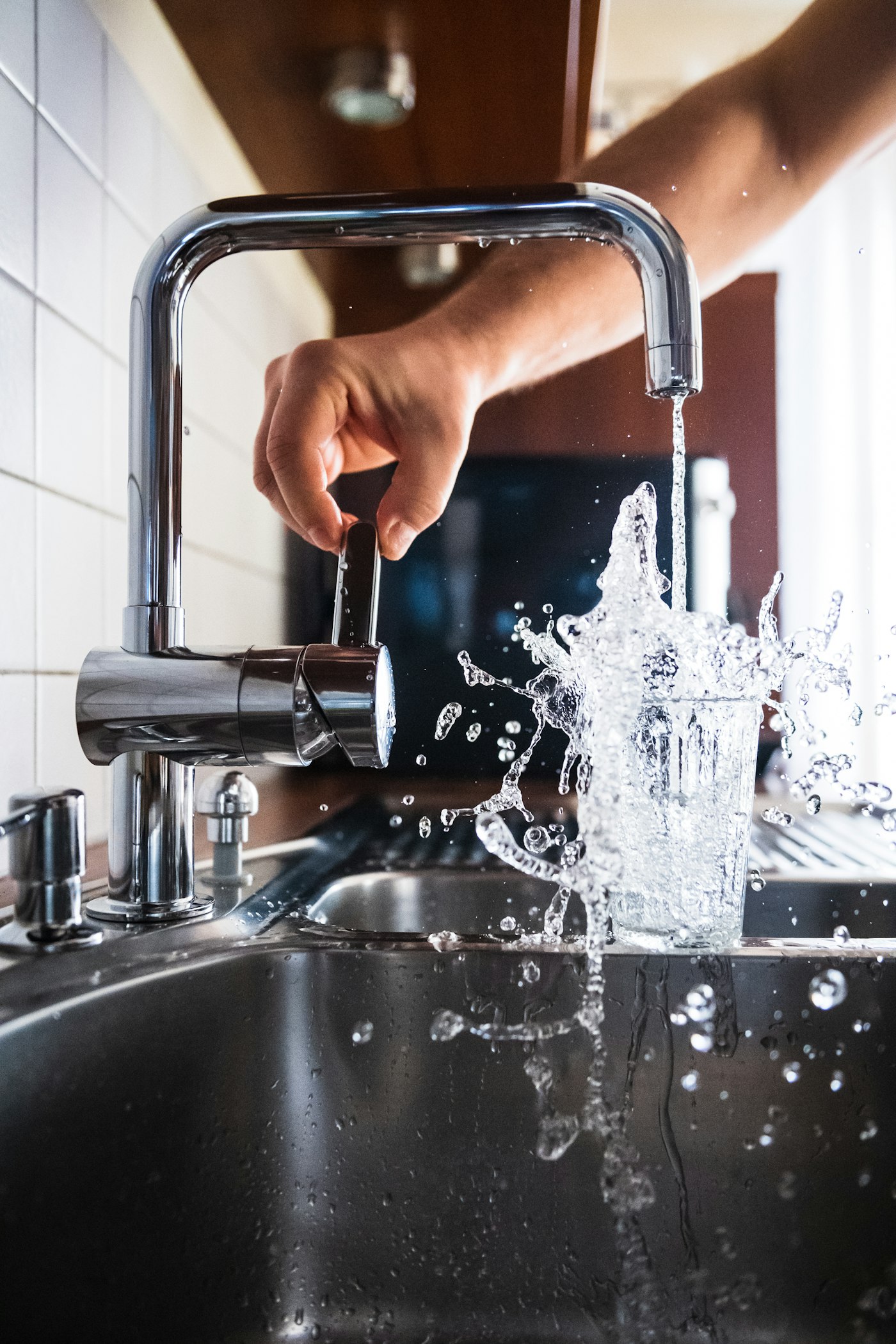 Clean water running from a kitchen faucet